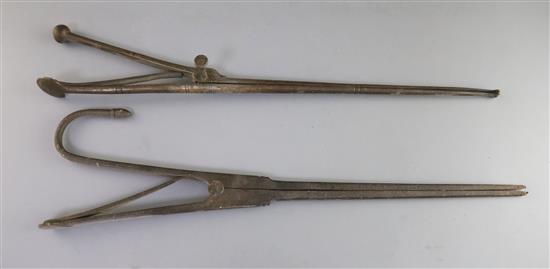 Two pairs of 18th century steel pipe tongs, 18in.